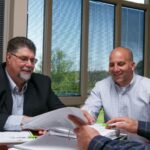 Group of professionals around table
