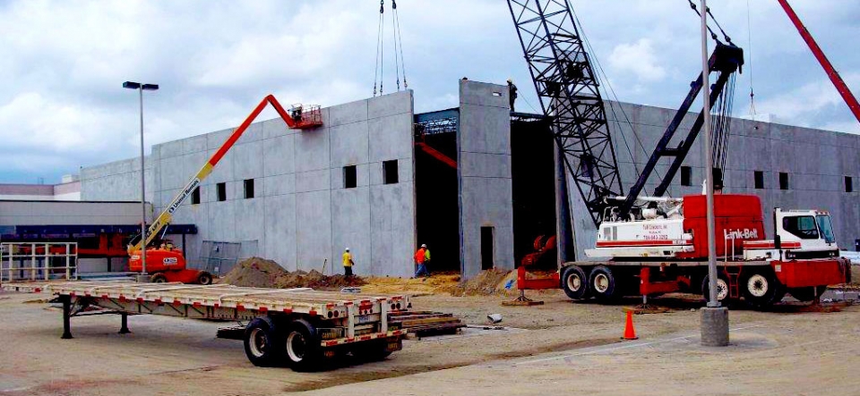 Panels placed by crane for building addition