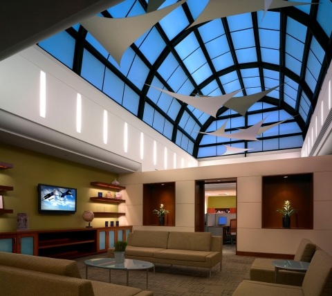 arched skylight over office area