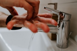 person washing hands