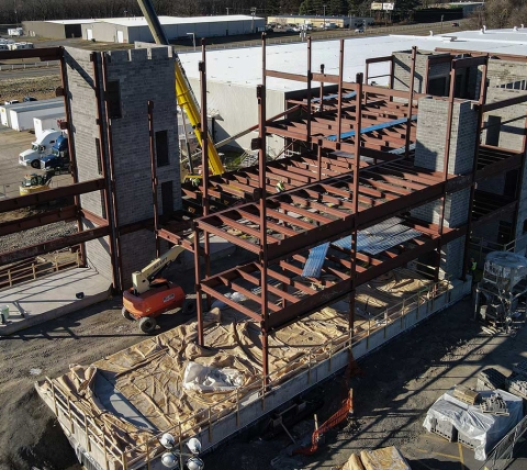 steel frame erected on industrial building addition