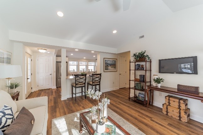 white apartment with wood floors