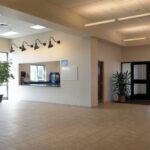 Interior view of Lancaster County Christian School gymnasium addition featuring the lobby and snack bar area