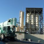 Exterior view of Rohrer’s Quarry concrete batch plant showing silos, conveyor, and enclosed facility built by Horst Construction in Lititz, PA.