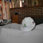 hard hat on blueprints