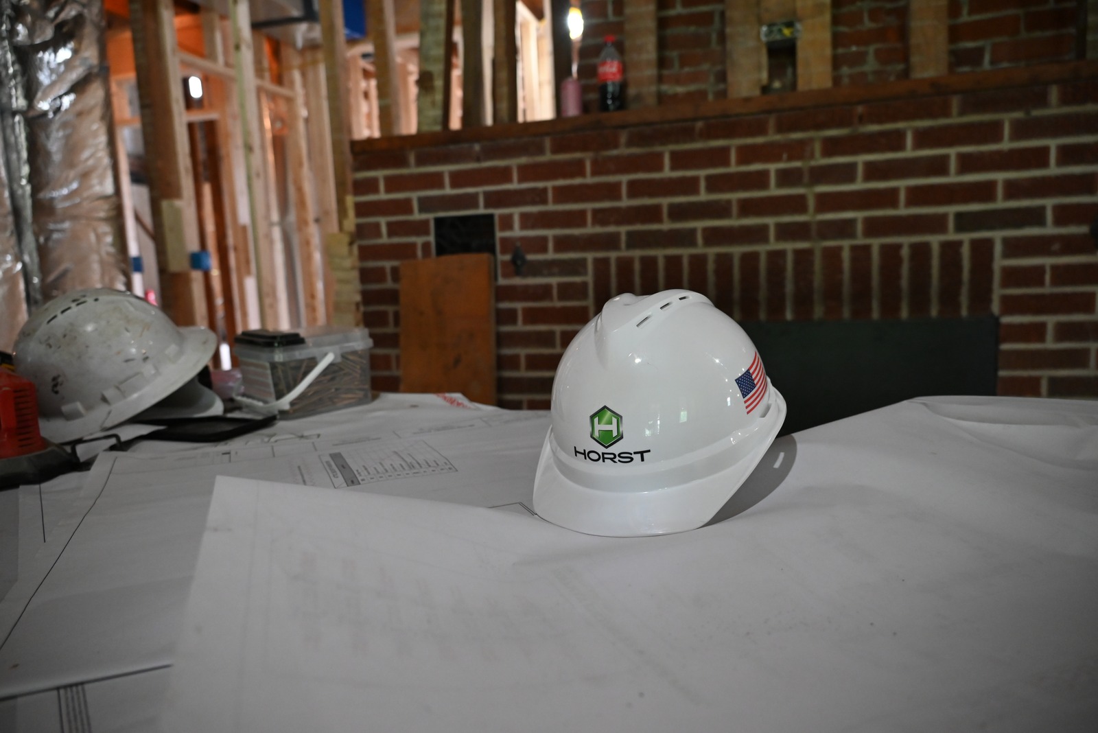 hard hat on blueprints